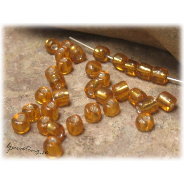 Topaz silverlined seedbead i glas ca 4 mm