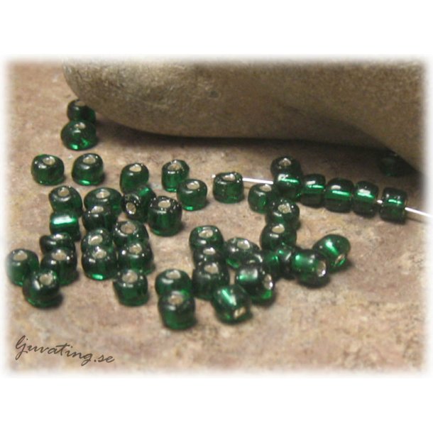 Mossgrna silverlined seedbeads i glas ca 4 mm