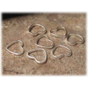 Sm slutna silverfrgade hjrtan 20-pack ca 7,5x6,5 mm