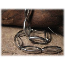 Stor clear ellipsformad med silverkant ca 30x13 mm