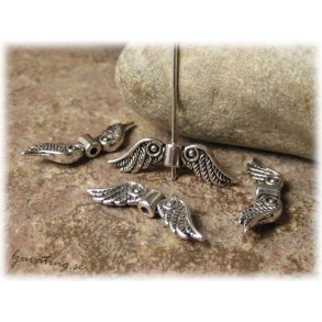 Vinge i platinafrgad metall ca 23x7 mm