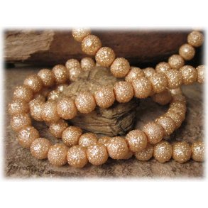 1 strng champagne glasprla isprla med struktur ca 8 mm