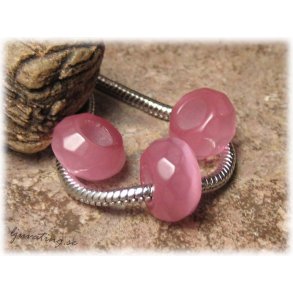 Ormlnksprla facetterad rosa cat eye ca 13x8 mm