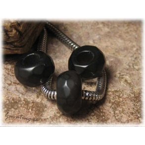 Ormlnksprla facetterad svart cat eye ca 13x7 mm