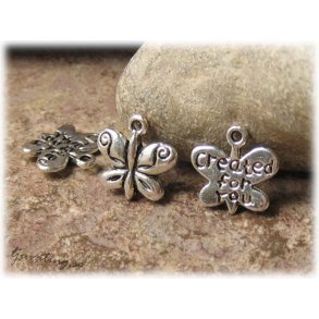 Berlock fjril i tibetsilver med text ca 13x13 mm