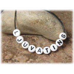 Bokstavsprla K i acryl  20-pack ca 7 mm