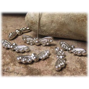 Blank vinge med snirklar platinafrg ca 22x7 mm