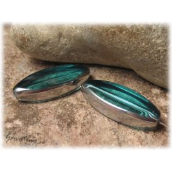 Stor turkos ellips med silverkant ca 30x13 mm