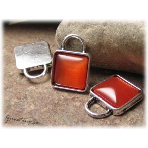 Berlock med orange cats eye prla ca 21x15 mm