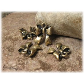 Berlock rosett i metall bronsfrgad ca 18x16 mm