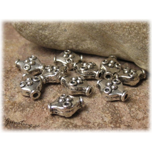 Romb i metall med mnster 10-pack ca 11x8 mm