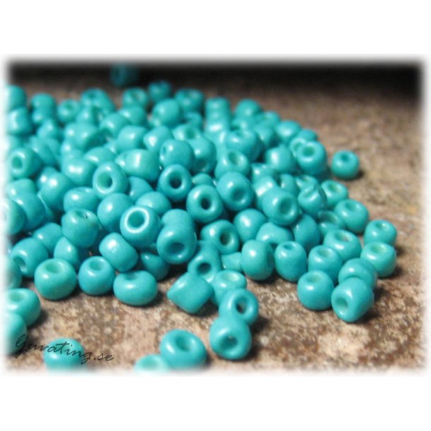 Seed beads opak mrk turkos storlek 8/0 ca 3 mm
